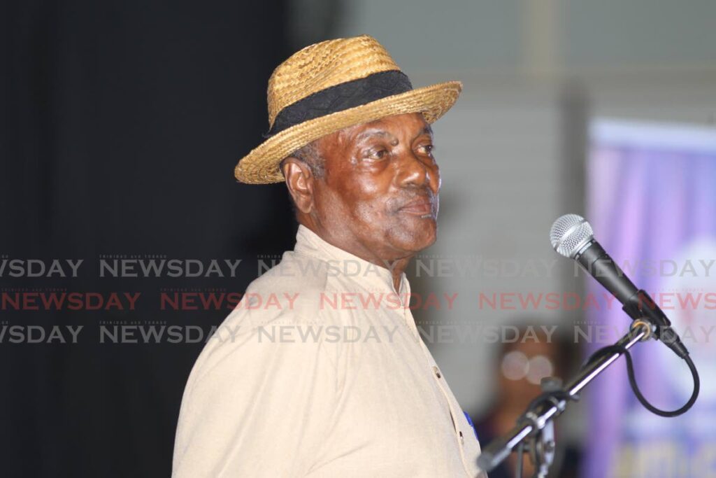 I WILL NOT SHUT UP: Retired police supt Johnny Abraham at the second UNC anti-crime talks at Naparima College, San Fernando on Monday night.  - LINCOLN HOLDER 