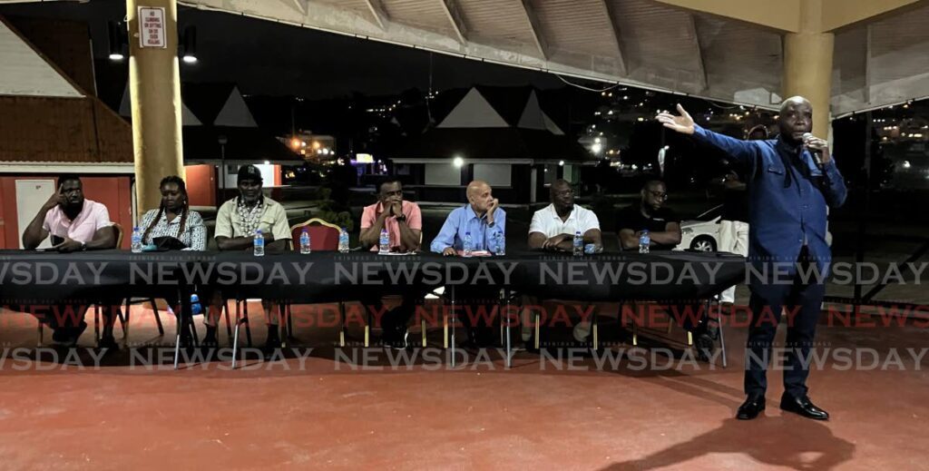 Scrap Iron Dealers Association president Allan Ferguson, right, and a panel discuss the crime situation in TT, at the Scarborough Esplanade on Monday.  - Jaydn Sebro