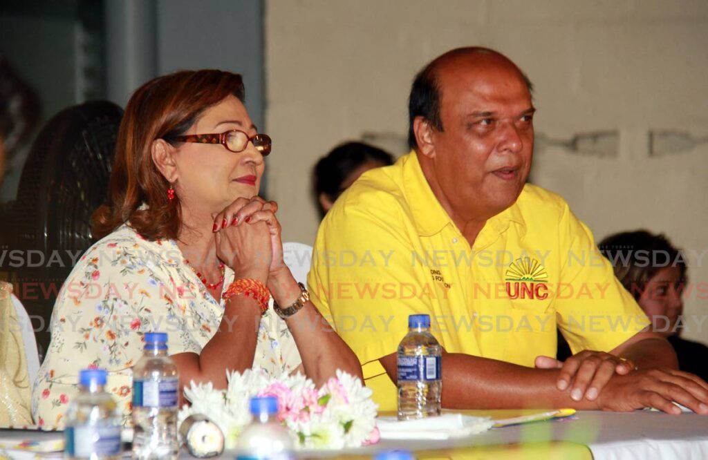 Opposition Leader Kamla Persad Bissessar and the late Fazal Karim. - File photo