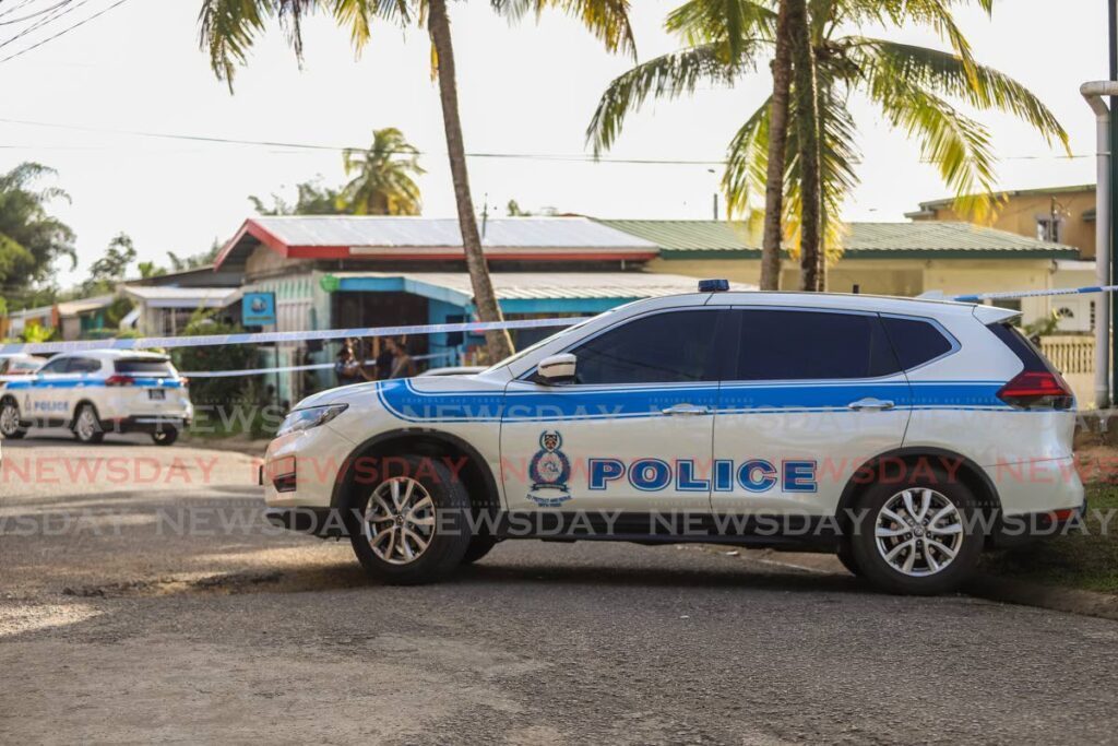 Police at a crime scene. - File photo by Jeff K Mayers