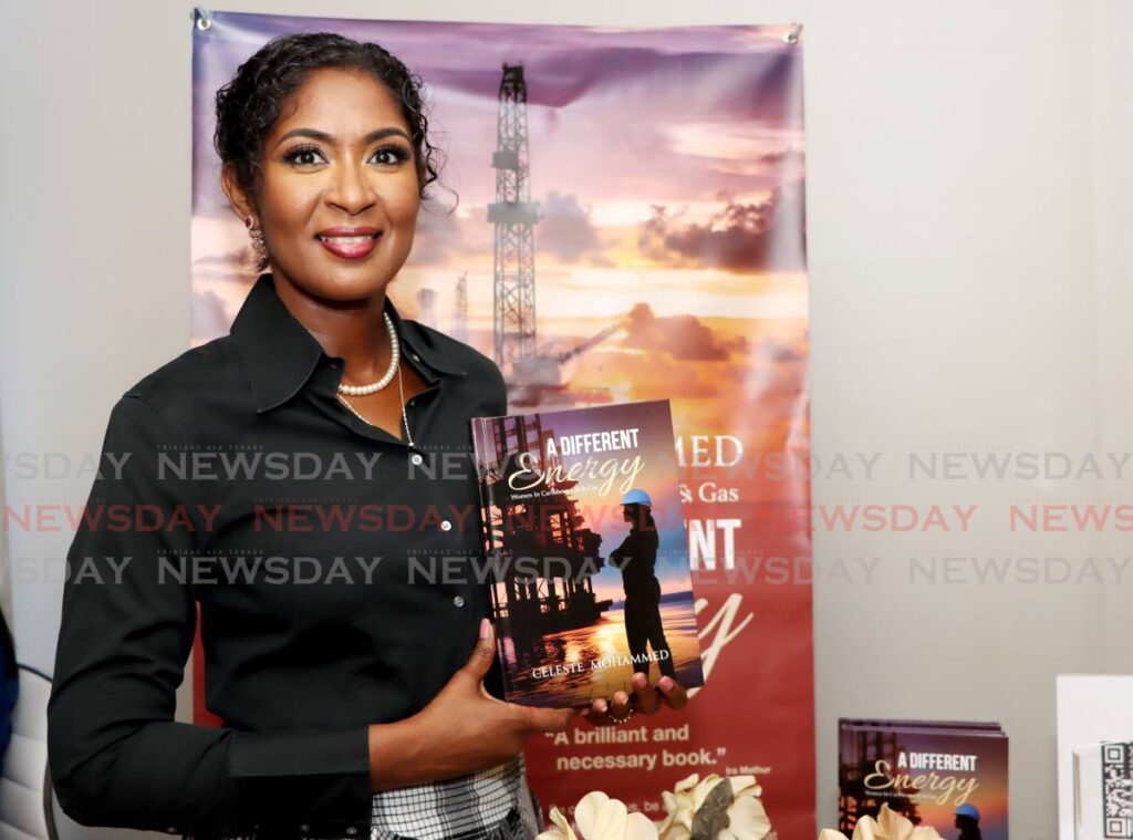 Author Celeste Mohammed displays her book, Women in Oil and Gas, during the TT Energy Conference 2024 at the Hyatt Regency in Port of Spain on January 23.  - Photo by Ayanna Kinsale