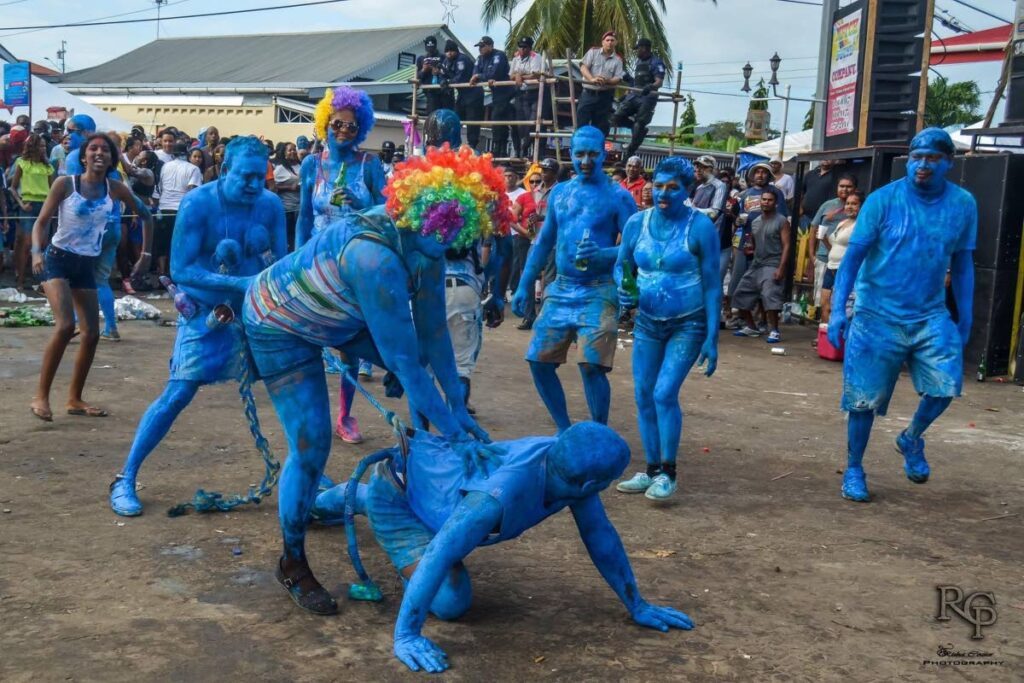 Cedros villagers play devil mas during J’Ouvert in 2023 - 
