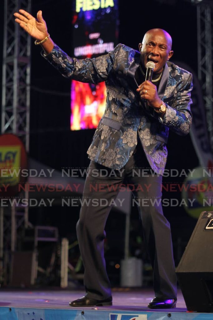 Winston Peters, singing Ungrateful at Calypso Fiesta, Skinner Park San Fernando on February 3. - Photo by Lincoln Holder