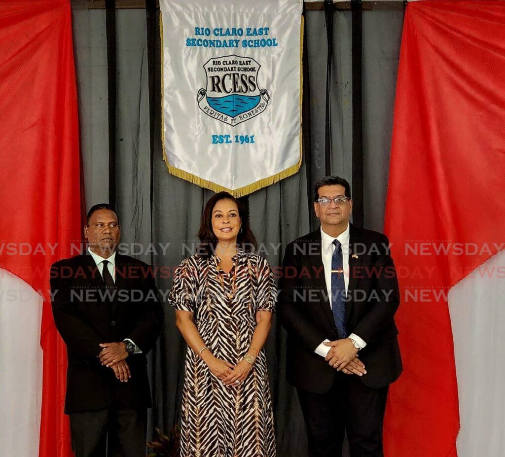 US Ambassador to TT Candace Bond, center, with Rio Claro East Secondary School principal Zarilal Gayadeen, left, and Mayaro MP Ruston Paray, right, during a visit to the school on Monday. - 