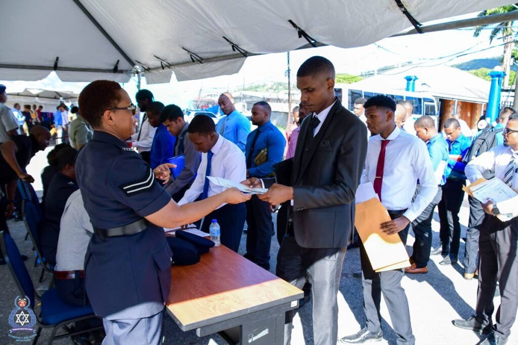 Some of the men who were screened in January for recruitment in the police service at the Police Academy, St James. - Photo courtesy TTPS