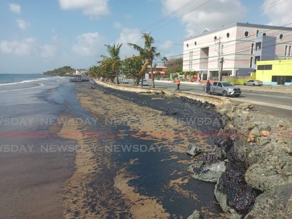 Remnants of the oil spill scar the shoreline of the Scarborough waterfront in Tobago on February 10.  - Photo by Corey Connelly