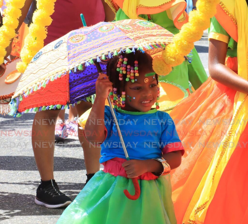A little reveller from Spoilt Rotten Kids’ presentation Shaadi at the Downtown Carnival Committee’s Junior Parade of the Bands at South Quay, Port of Spain on February 11. - Photo by Roger Jacob