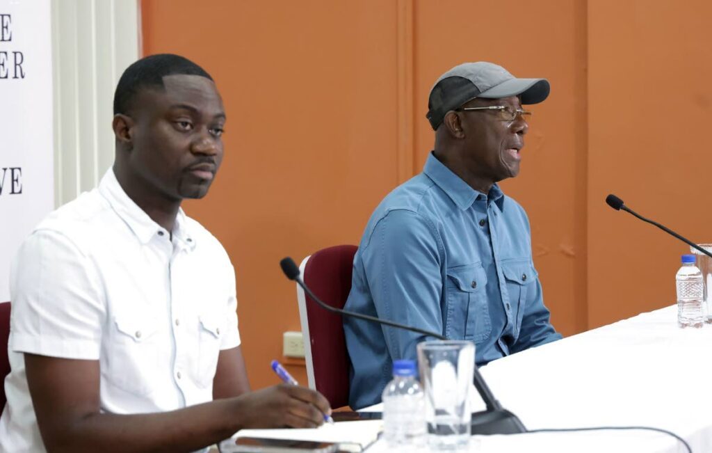 Prime Minister Dr Keith Rowley, right, and Chief Secretary Farley Augustine during a media conference in Tobago on the impact of a mysterious oil spill. - Photo courtesy THA