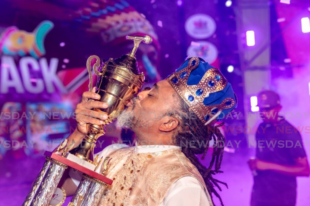 Machel Montano kisses his trophy after he won the 2024 Calypso Monarch finals at Queen's Park Savannah, Port of Spain on February 11. - Photo by Jeff K Mayers