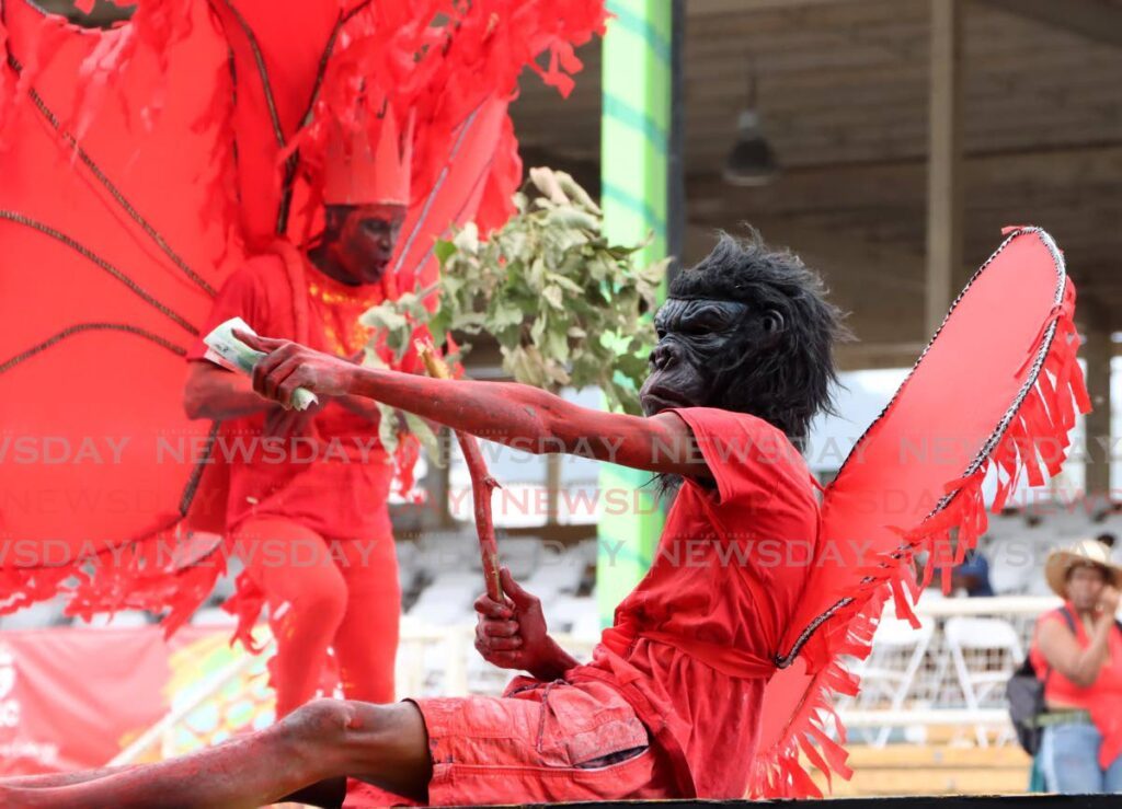 A red devil in the Traditional Mas competition at the Queen's Park Savannah, Port of Spain, on February 12. - Photo by Ayanna Kinsale