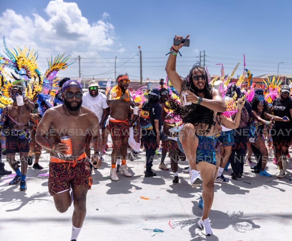 Tribe crossing the stage at the Soca Drome on Carnival Tuesday.  - Photo by Jeff K. Mayers