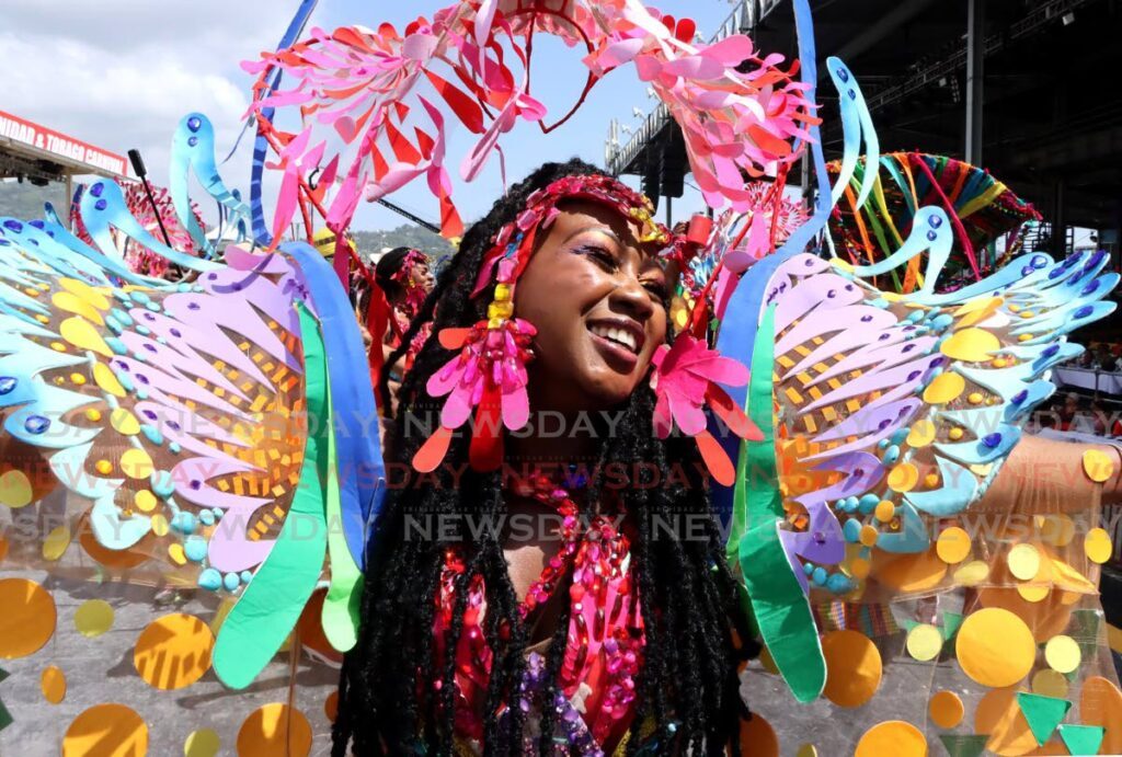 Afiya Francis enjoys herself as she paraded across the stage with The Lost Tribe's Fly. - Photo by Ayanna Kinsale