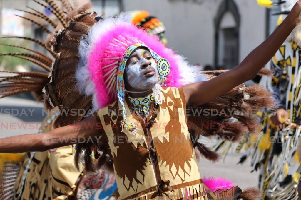 A masquerader with the band June Andrews, Anton Duncan and Associates Cherokee Bustle Dancers at King’s Wharf, San Fernando on Carnival Tuesday.  - Photo by Lincoln Holder 