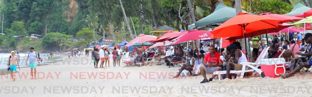 The shores of Maracas Beach were full as beach-goers cooled off on Ash Wednesday. 