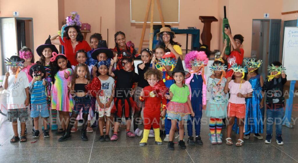 Migrant children enjoy a Carnival event at the Aranguez Community Centre on February 9. - Photo by Grevic Alvarado
