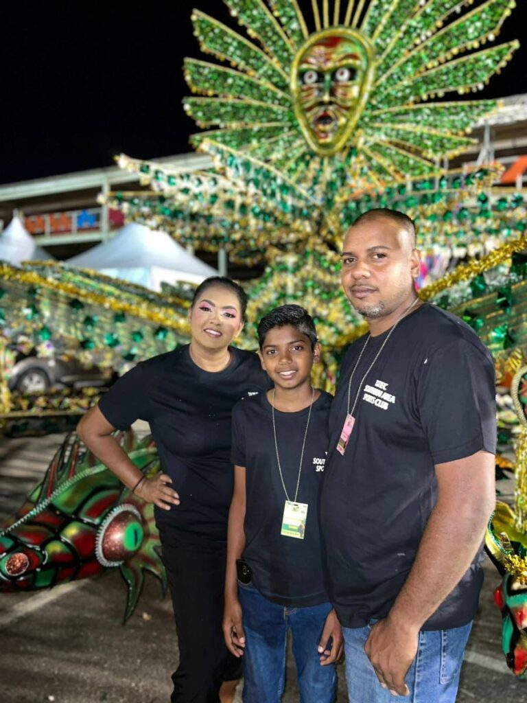Junior King of Carnival Antonio Rampersad with his parents.  - 