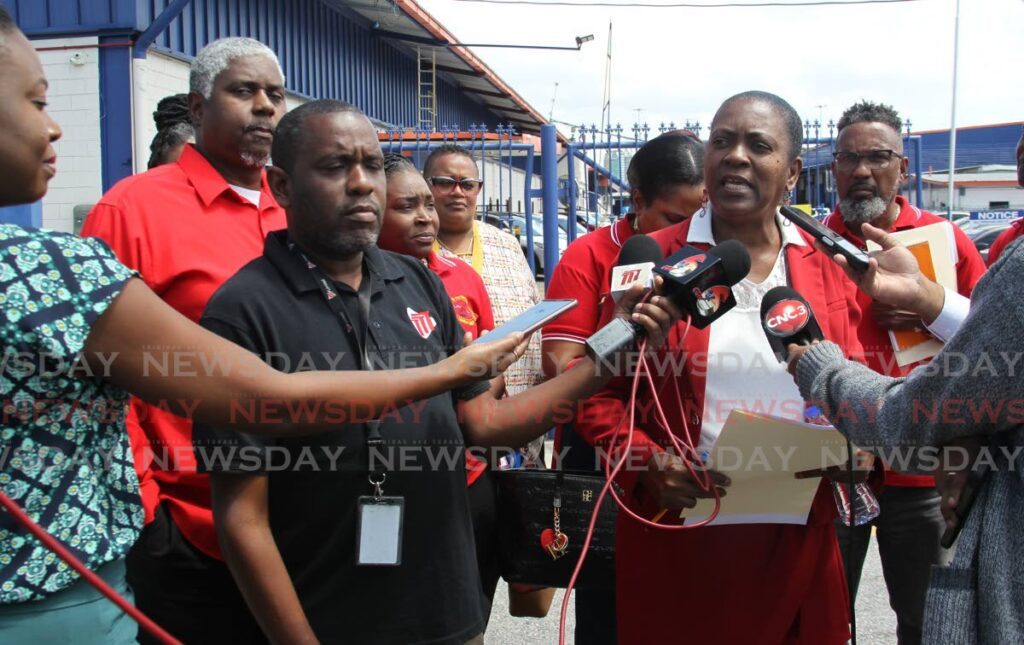 Ermine Debiquemeade Contractors and General Workers Trade Union CGWTU president general alongside her supporters speaks with media after their meeting concerning safety concerns with Massy managers at Massy Head Office on Wrightson road Port of Spain on February 17. - Photo by Faith Ayoung