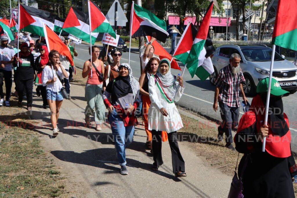 Some of the people who joined the rally outside the US Embassy in Port of Spain on February 17 calling for a ceasefire in war against Palestine. - Photo by Angelo Marcelle