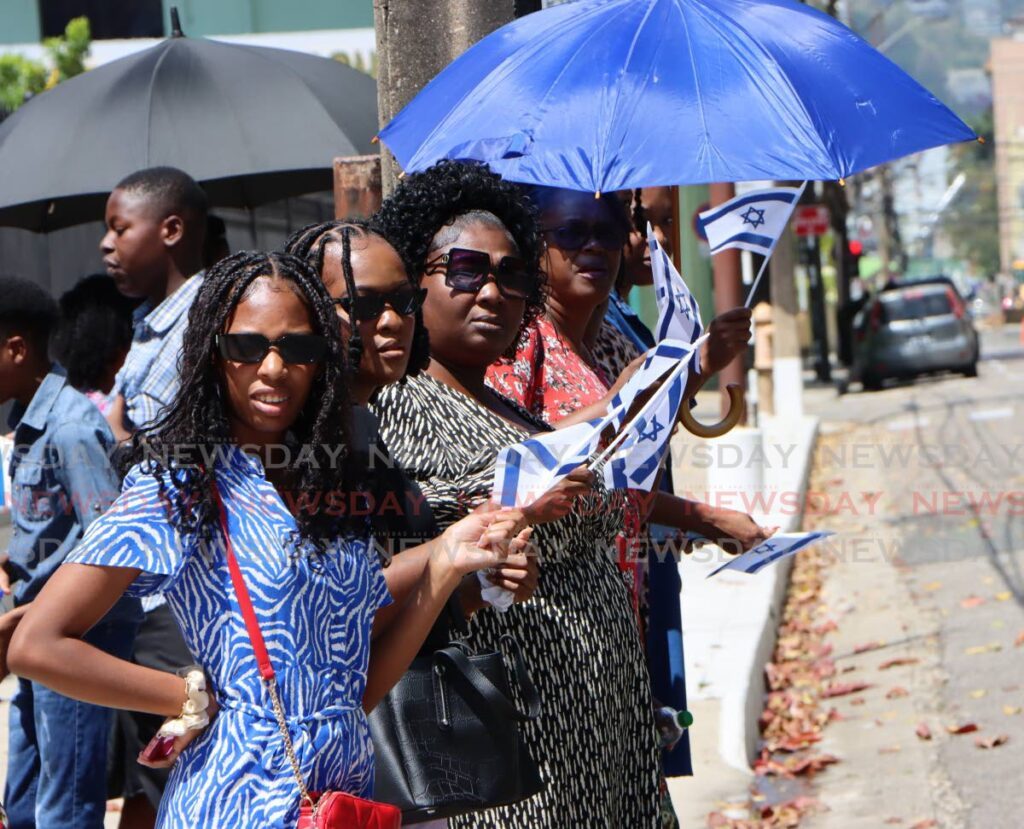 Pro-Israel supporters marched around the Red House in Port of Spain on February 18. - Photo by Angelo Marcelle