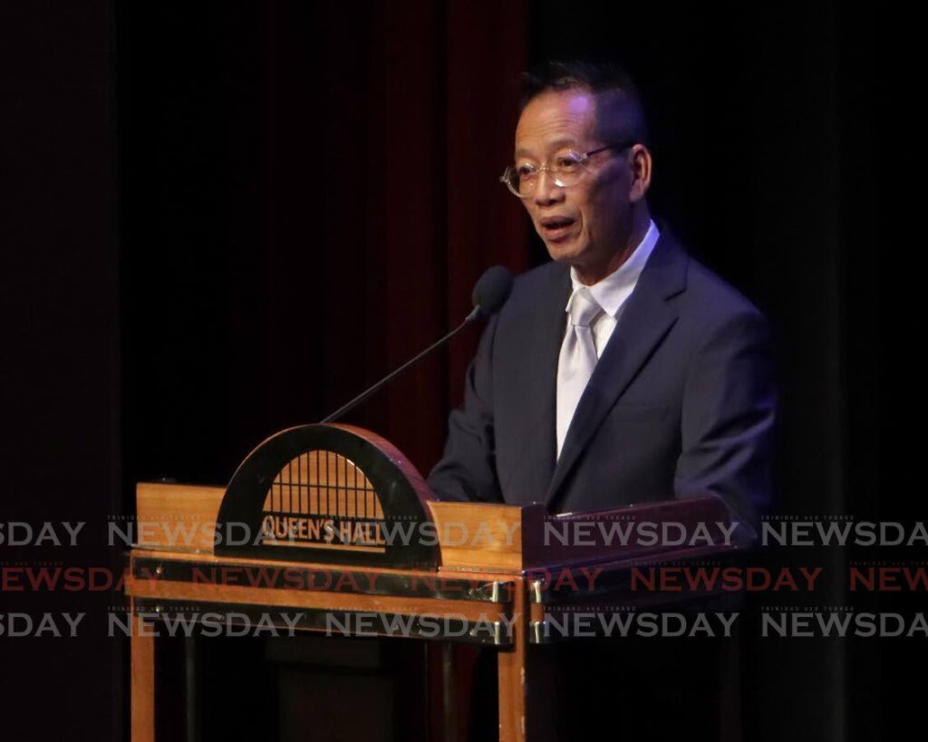 Championship adjudicator Dr Richard Tang Yuk gives his remarks  at the opening ceremony of the 35th Biennial Music Festival, at Queen's Hall, St Ann's, on February 18. - Photo by Angelo Marcelle