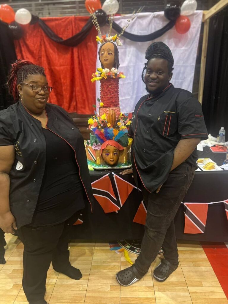  Dexter Cambridge and his mother Donna Cambridge with his winning cake Queen of Bacchanal. - 