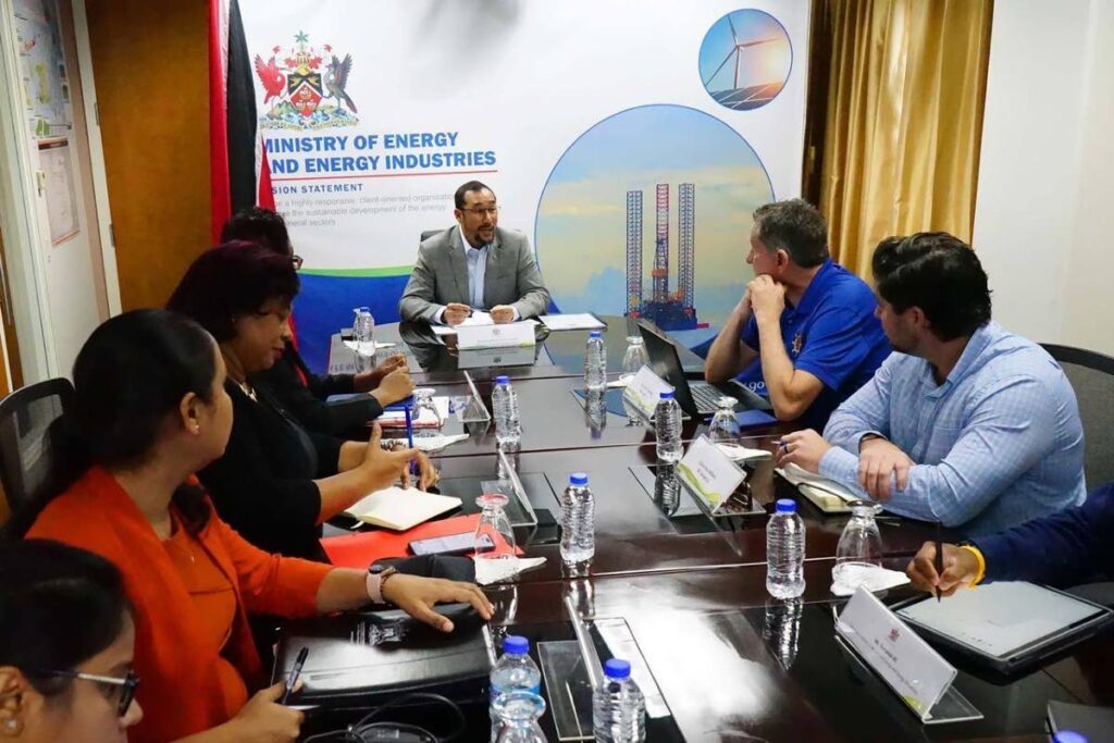 Minister of Energy and Energy Industries and Minister in the Office of the Prime Minister Stuart Young, centre, is briefed by the T&T Salvage team at the ministry's office in Port of Spain on February 21. - Photo courtesy the Ministry of Energy and Energy Industries