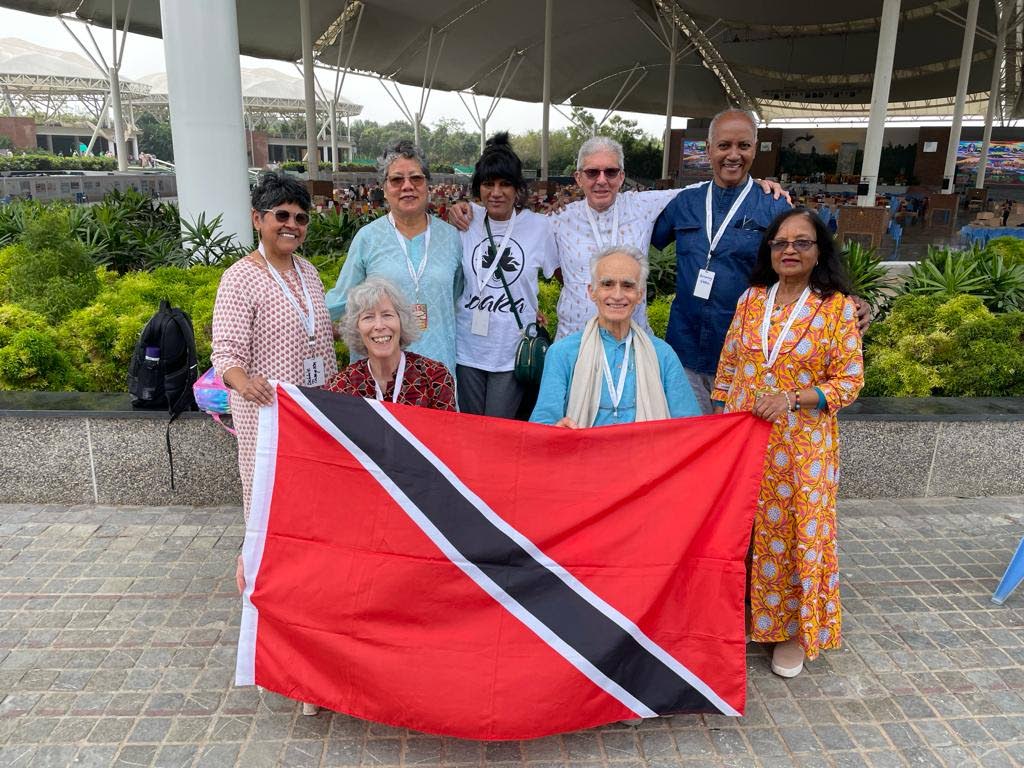 Some of the Trinidadian participants of the 10,000 for World Peace Assembly (standing) and their facilitators. Photo courtesy Shelley Hosein. - 