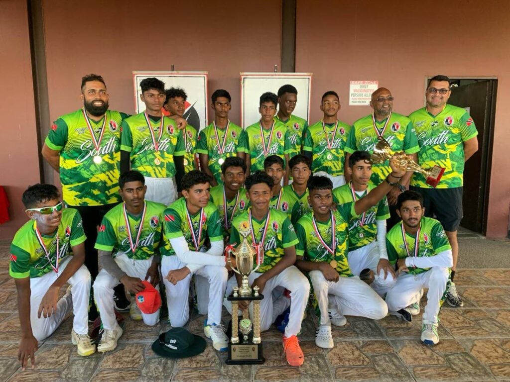 The victorious South zone under-15 cricket team pose with their trophy after beating the Central zone in the TTCB's interzone under-15 final on February 23. - Photo courtesy TTCB