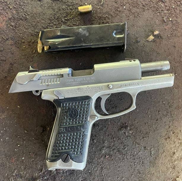 The pistol and ammunition which was seized by police after the Petit Valley shooting on February 24.  - Photo courtesy TTPS