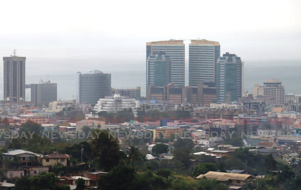 This photo, taken at the Lady Young Road in Belmont, shows Port of Spain blanketed by Sahara dust on Sunday.  - Photo by Roger Jacob