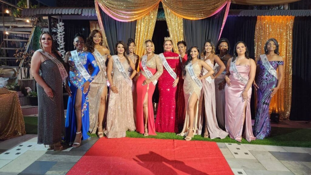 Mrs Universe delegates pose with the reigning Mrs Universe TT Alveada Meah at centre. - 