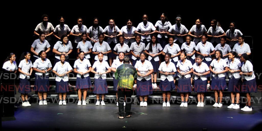 St Joseph's Convent choir place first in the Junior Choirs 19 Years and Under Final with their performance of the test piece Pretty Pollie Pillicote by Gordon Jacob at the T&T Music Festival at Queen's Hall, St Ann's on February 29. - Photo by Faith Ayoung