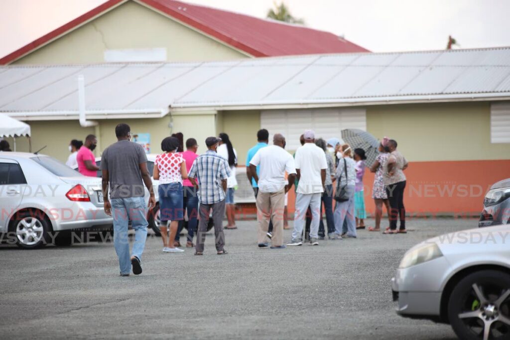 Voters outside Bon Accord Government Primary School during the 2021 THA elections. - File photo by Jeff K Mayers