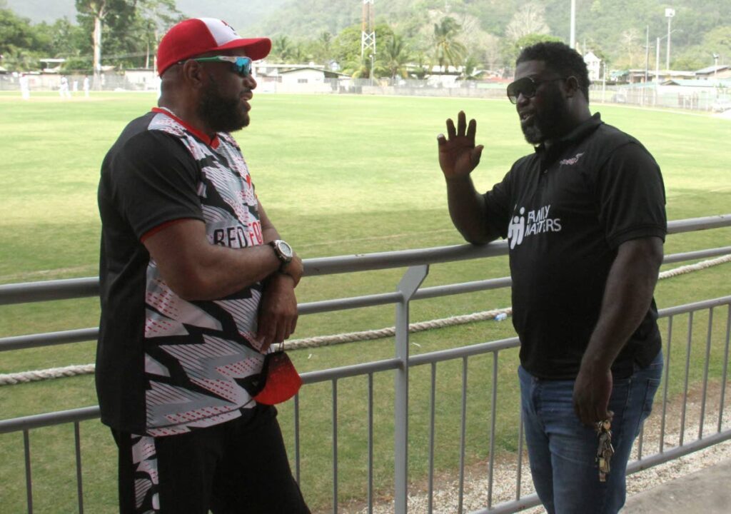 In this May 19, 2022 file photo, president of Merry Boys Cricket Club Sebastien Edwards (L) speaks with club captain/coach Mario Belcon at the Diego Martin Sporting Complex, Diego Martin.  - Photo by Ayanna Kinsale
