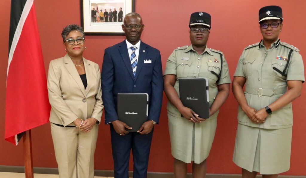 From left: Chairman of the Police Service Commission Judith Jones, Deputy Commissioners Junior Benjamin and Natasha George, and Commissioner of Police Erla Harewood-Christopher during a ceremony on February 29 where the two deputies were given letters of appointment. - Photo courtesy the Police Service Commission