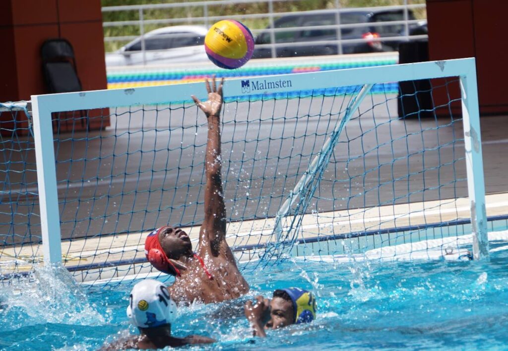 Fatima's Joshua Cumberbatch makes a save  in the boys' under-16 encounter versus the Combined Team in Secondary Schools Water Polo League (SSWPL) action at the National Aquatics Centre, Couva on March 3. - Photo courtesy Dawn Hackett