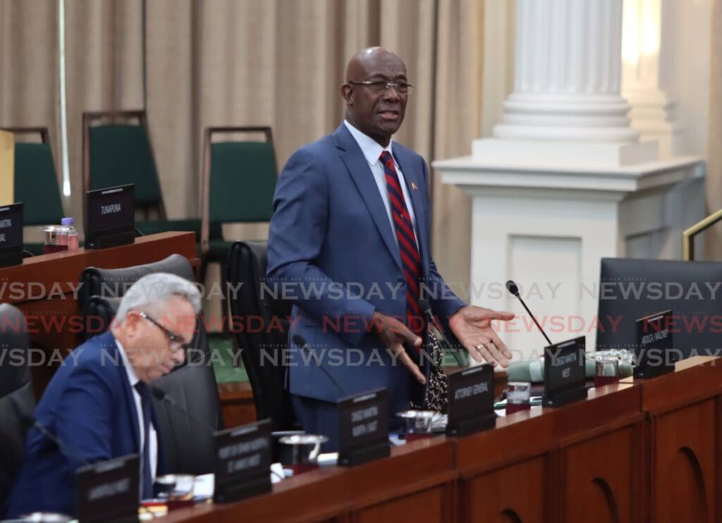 Dr Keith Rowley, right, and Colm Imbert. - 