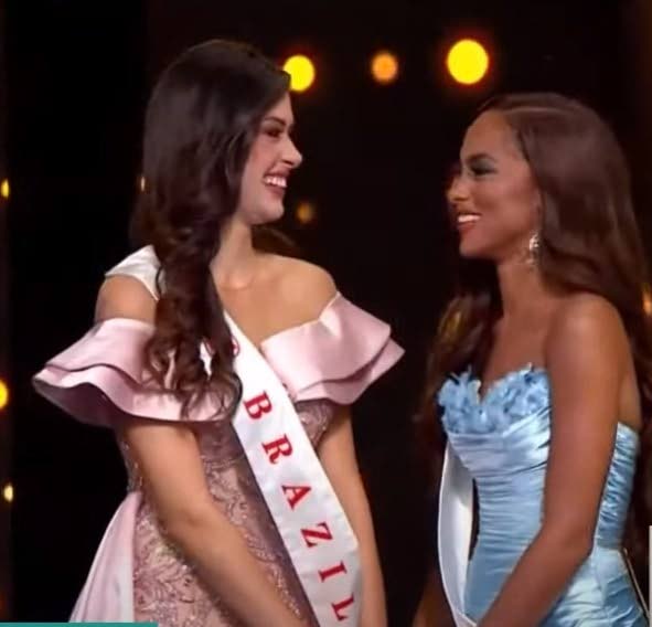 Miss World TT Aché Abrahams (r) and Miss World Brazil Leticia Frota (l) on the Miss World 2024 stage in Mumbai, India. Abrahams was crowned Miss World Americas and the Caribbean. - 