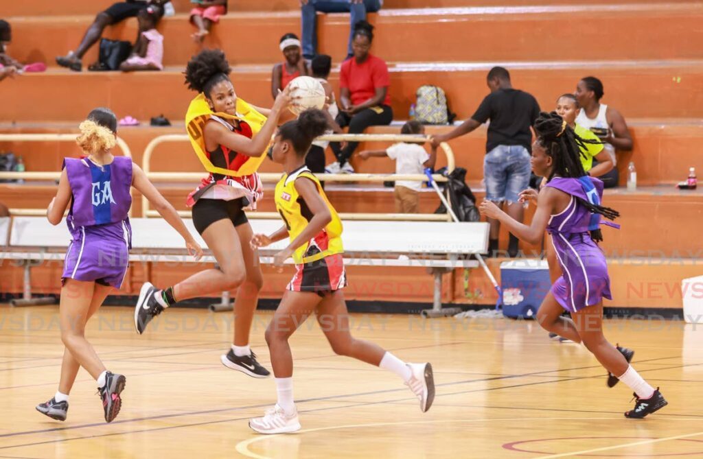 A UTT player receives a pass against Police Netball Youth Club, in Courts All Sectors Netball fast5 premiership action on March 9. - Photo by Jeff K Mayers 