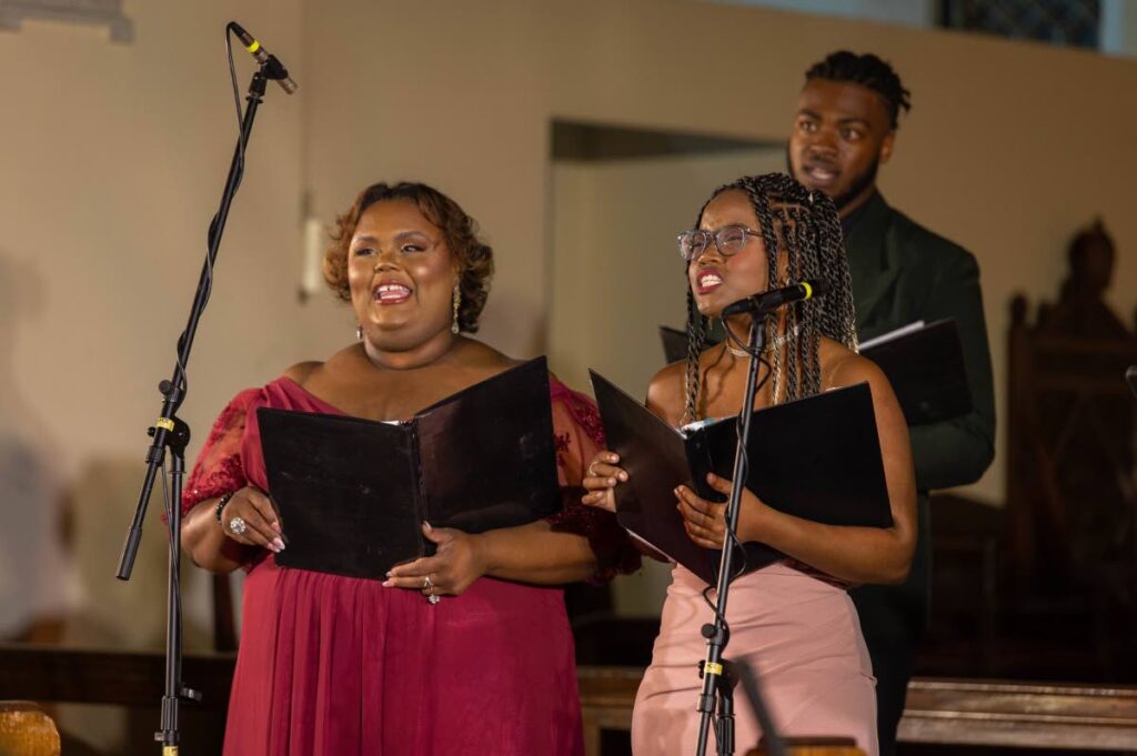 A small chorus performs at Chandelier Productions event Rest (2023) under the direction of esteemed conductor and composer Michael Hudlin. (1) - 