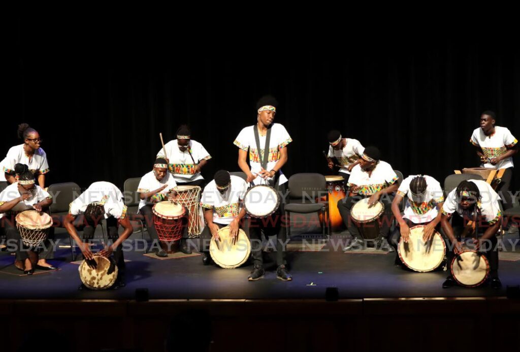 Y'Aim African Drumming Ensemble perform in the Junior Drumming Ensemble category during the TT Music Festival at Queen's Hall, Port of Spain. - Photo by Ayanna Kinsale