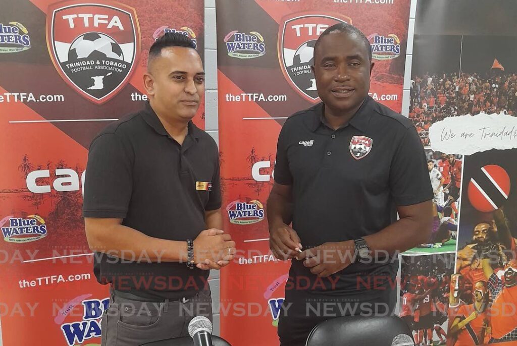 Soca Warriors head coach Angus Eve, right, and TTFA's director of communications Shaun Fuentes, at the March 14 Copa America play-in squad announcement at the Hasely Crawford Stadium, Mucurapo.  - Photo by Roneil Walcott