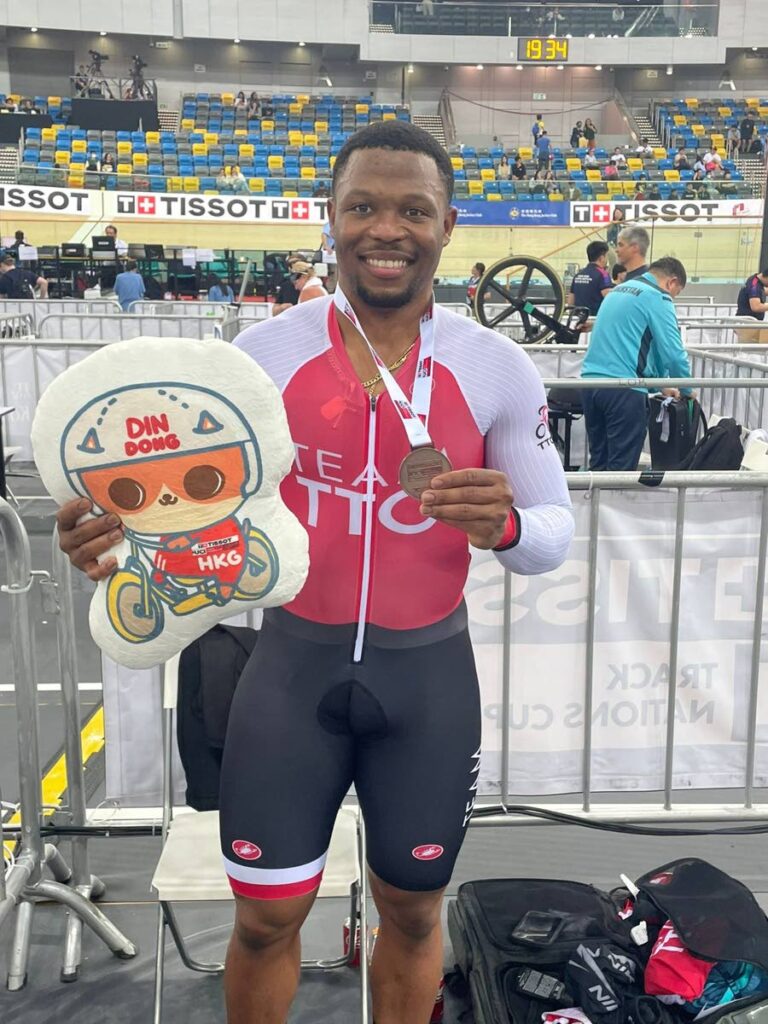  TT sprint cyclist Nicholas Paul shows off his UCI Nations Cup sprint bronze medal in Hong Kong, China, on Sunday. - 