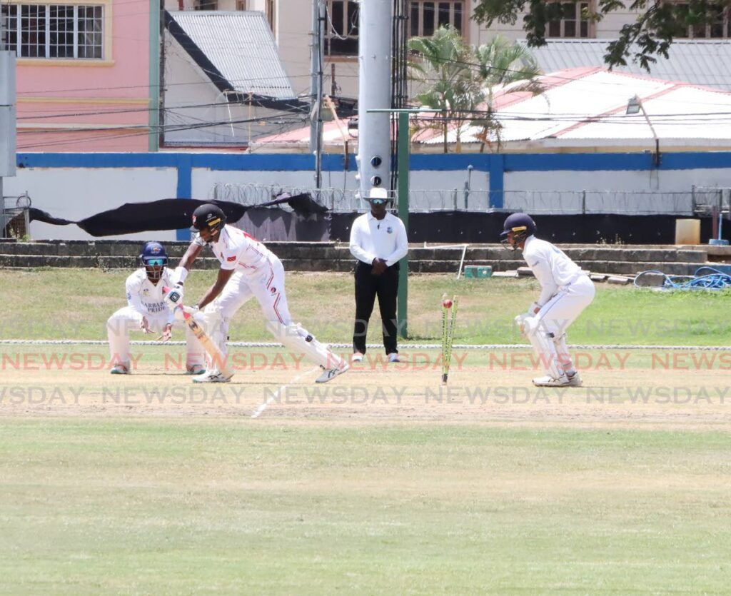 Red Force batsman Bryan Charles is bowled during the West Indies Four-Day Championship match against Barbados Pride at the Queen’s Park Oval, St Clair, on March 20, 2024. - AYANNA KINSALE