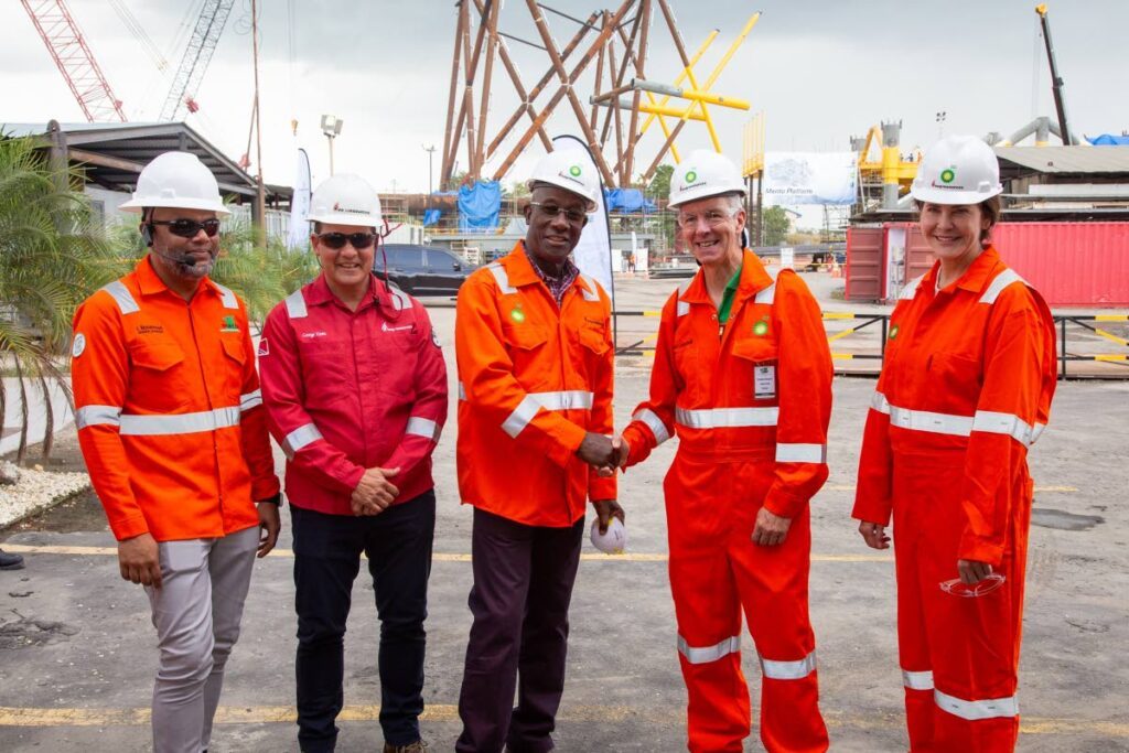 Prime Minister Dr Keith Rowley, centre, meets with representatives from EOG, bpTT and TOFCO, during a tour of the Mento Platform being fabricated at La Brea on March 20. - Photo courtesy bpTT 