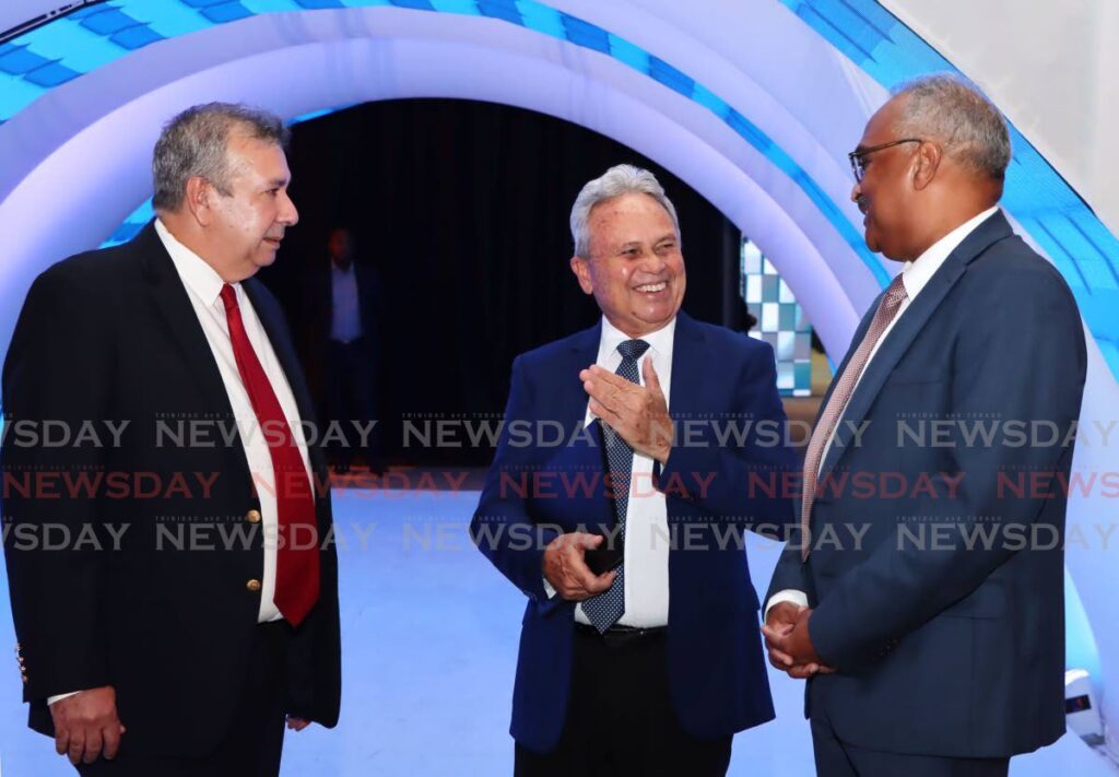 From left, TT Mortgage Bank (TTMB) chairman Patrick Ferreira, Finance Minister Colm Imbert and CEO of TTMB Robert Green speak during the TTMB brand launch at the Hyatt Regency, Port of Spain on March 20. - Photo by Ayanna Kinsale  