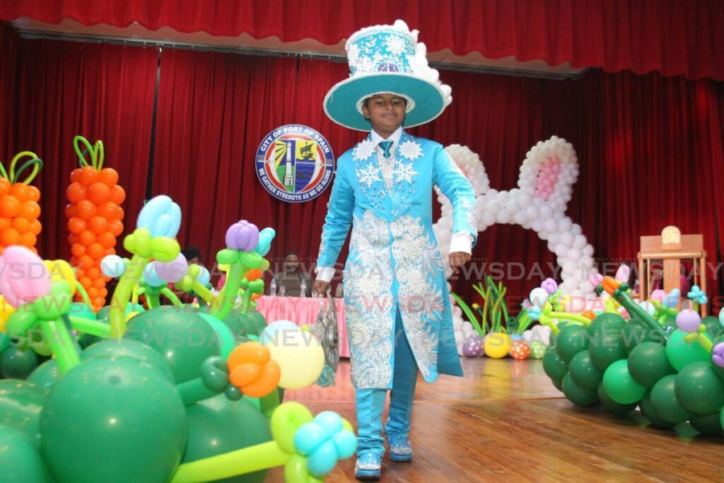 Jace Angelo struts down the runway in his costume 'Frozen in Time' for the Easter Bonnet Parade and Competition at City Hall, Port of Spain on March 22.