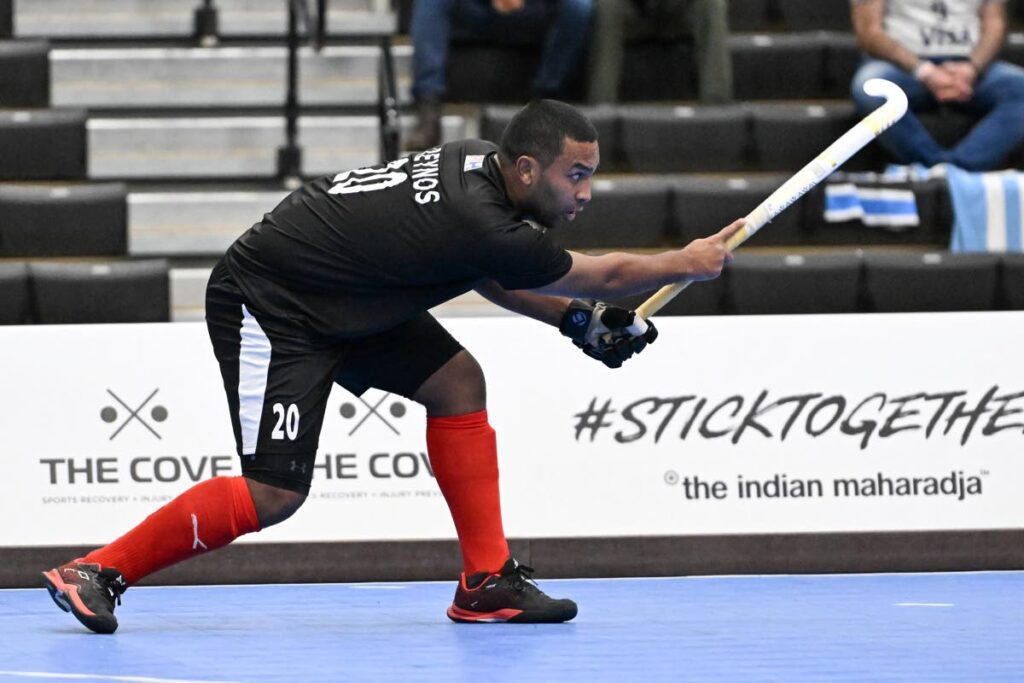 Trinidad and Tobago men’s hockey player Jordan Reynos makes a forward play during the final of the 2024 Indoor Pan American Cup against against Argentina in Calgary, Canada on Friday. Photo courtesy Pan American Hockey Federation.  - 
