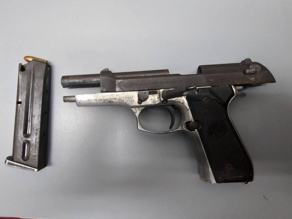 A pistol and loaded magazine seized in Barataria. - Photo courtesy TTPS