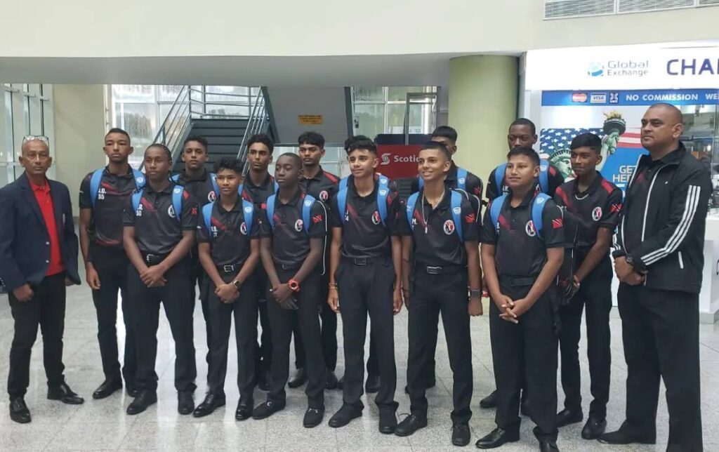 The TT Under-15 cricket team along with officials. - 